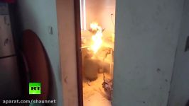 Burning at work Chinese firefighter nonchalantly grabs blazing gas tank