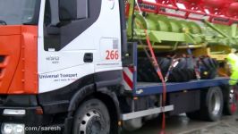 Universal Transport  Unloading Claas bine harvester with trailer