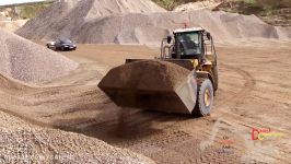 New Cat 980M Wheelloader Loading Volvo FH12 Semi Trucks