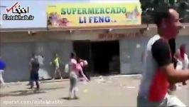 فیلم غارت فروشگاه ها توسط مخالفان مادورو در ونزوئلا