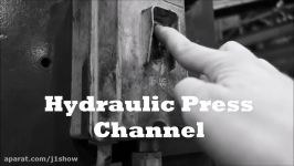 Crushing golf ball with hydraulic press