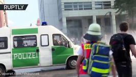 Kissing in the rain Amorous G20 protesters soaked by police in Hamburg