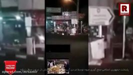 جمع آورى میوه توسط مردى آبرودار براى فرزندانش درون سطل زباله