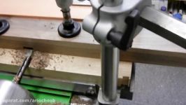 Felder FD250 Horizontal bore machine cutting walnut cupboard leg mortise for lower rail