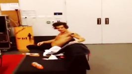 Harry shirtless in backstage