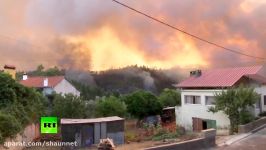 RAW Wildfires sweep through Portugal as country endures severe drought