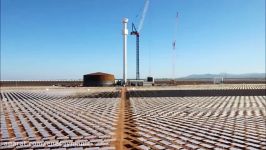 Timelapse  lifting up the top module of the 127m solar tower in South Australia