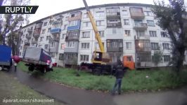 Love Is Man surprises girlfriend by hanging van on crane in Altai Russia