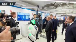 Hello Vladimir Putin Russian President shakes hand with ‘Promorobot’