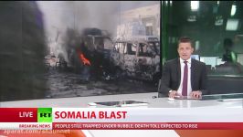 At least 22 killed as twin blasts rock Somali capital