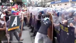 No War No Trump Protesters clash with riot police ahead of Trumps visit to Philippines