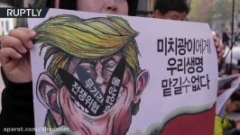 No Trump no war’ 1000s rally for peace ahead of US president’s visit to South Korea