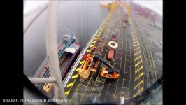 Liebherr LHM 550 Cargo Day +TiltShift effect Moving heavy cargo and unload a barge with steel