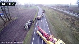 US army convoy sticks in mud in Poland