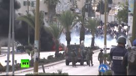 Clashes tear gas burning tires Rally in Bethlehem following Trumps Jerusalem move RAW