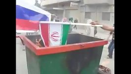 آتش زدن پرچم ایران وحزب الله توسط مخالفین بشار اسد2