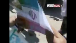آتش زدن پرچم ایران وحزب الله توسط مخالفین بشار اسد1