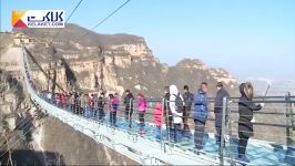 افتتاح طولانی ترین پل معلق شیشه ای جهان در چین