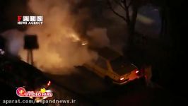 آتش زدن یک تاکسی در میدان فردوسی تهران توسط اغتشاشگران