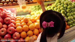 Kid Grocery Shopping with a toy cart by Kaycee