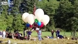 Man takes flight in a helium balloon powered lawn chair