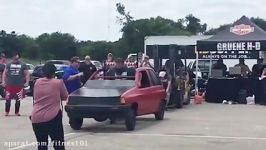 Robert Oberst carries 950 pound car