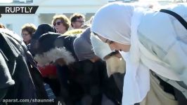 Muslims decry Trump travel ban with mass prayer in front of White House