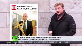 German judge removes cross during trial of Afghan migrant faces backlash