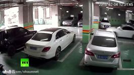 RAW Car smashes through garage wall falls from 2nd floor