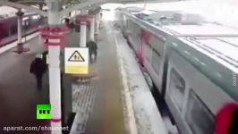 Snow ‘avalanche’ hits train arriving at station in Moscow