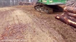 Loading logs with a John Deere log loader