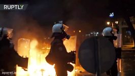 Tear gas burning bins Frustrated football fans clash with Greek cops