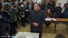 Topless FEMEN activist confronts Berlusconi as he votes