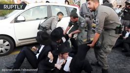 RAW Ultra Orthodox Jews clash with cops over military draft