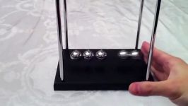 Newtons Cradle گهواره نیوتن