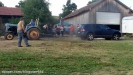 Tug of war Volkswagen Touareg vs tractor Hanomag PS 25 who is stronger Перетягивание машин