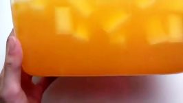 اسلایم نارنجی شفاف تکه های مدل یخ کپی ممنوع
